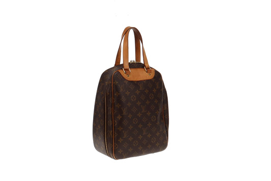Louis Vuitton Excursion Canvas Handbag (pre-owned) in Brown