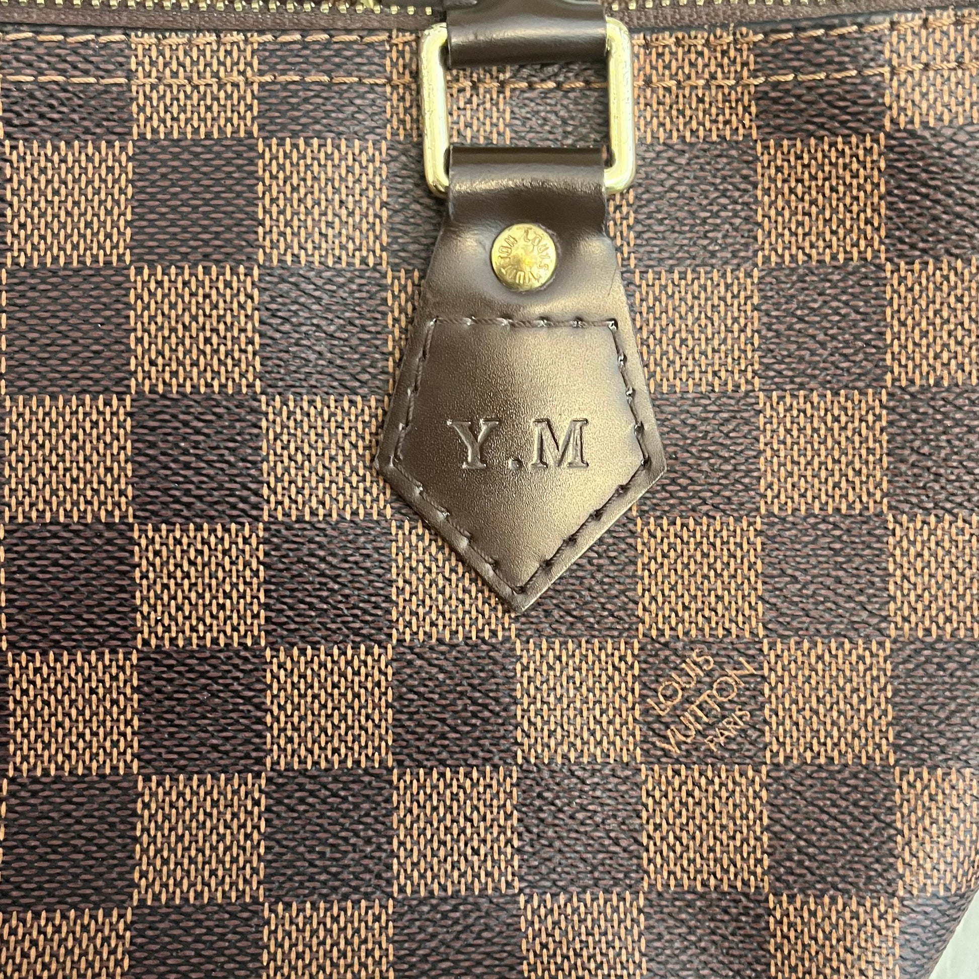 Hot stamped initials on my LV damier Bandouliere. Love!